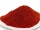 Schale mit Bio Chipotle gemahlen - rötlich-braunes Pulver